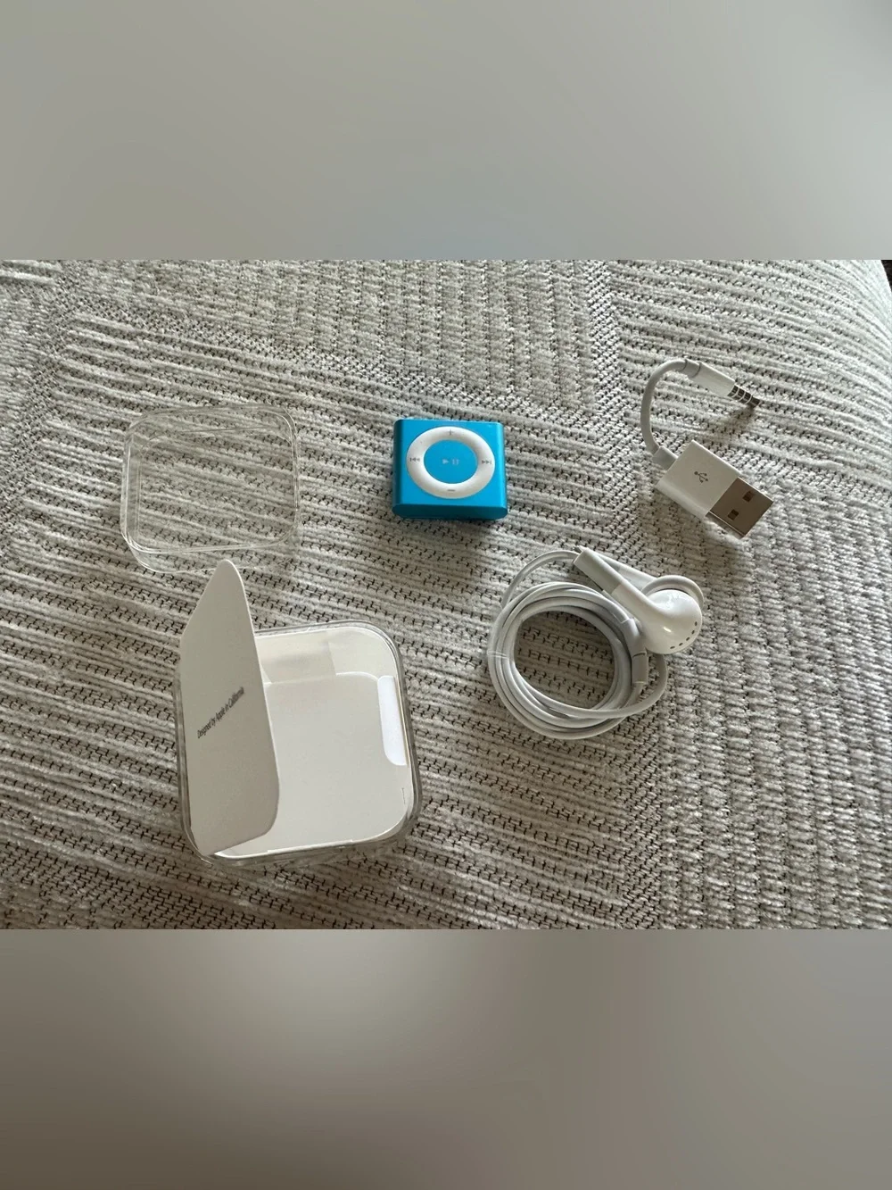 2gb Blue iPod Shuffle with Accessories- original packaging-never used.